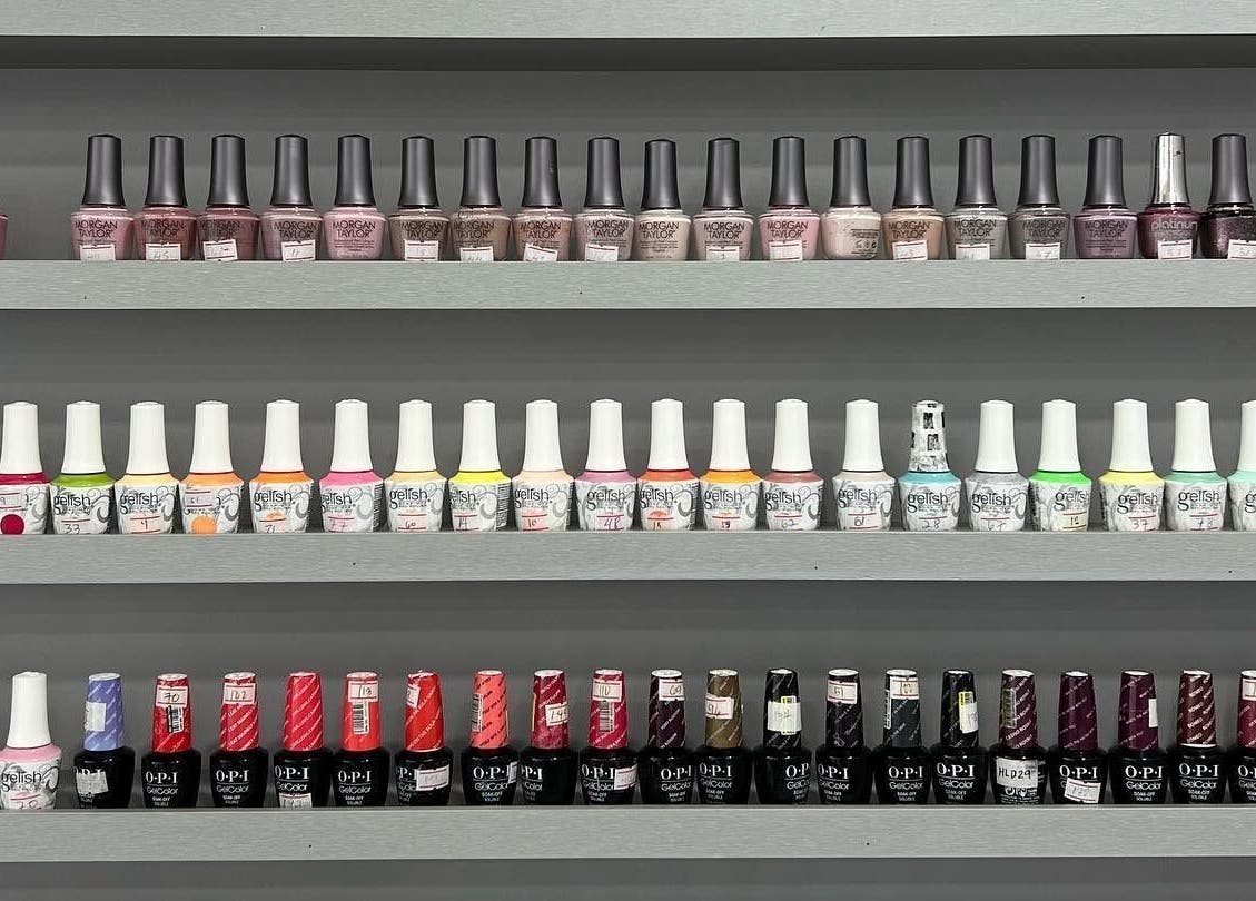 Colorful nail polish collection at Bel Fiore Ladies Salon, Abu Dhabi, Abu Dhabi, AE, showcasing variety.