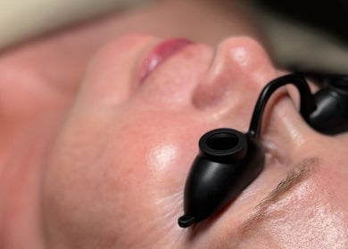 Close-up of skin treatment at The Glow Box Aesthetics, West Allis, Wisconsin, US, showing relaxation and care.