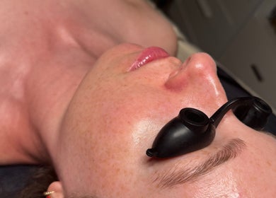 Client receiving a rejuvenating facial at The Glow Box Aesthetics in West Allis, Wisconsin, US.
