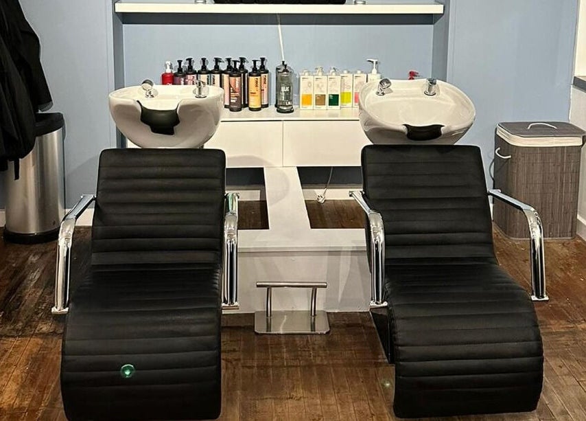 Elegant wash stations at Whites Hairdressing, Bromyard, England, GB, offering a relaxing salon experience.