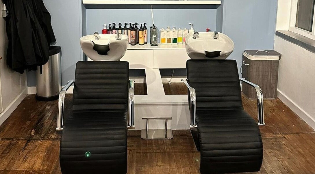 Elegant wash stations at Whites Hairdressing, Bromyard, England, GB, offering a relaxing salon experience.