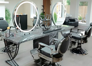 Modern barber chairs at Icon Barbershop Amsterdam, Noord-Holland, NL, with sleek design and mirrors.