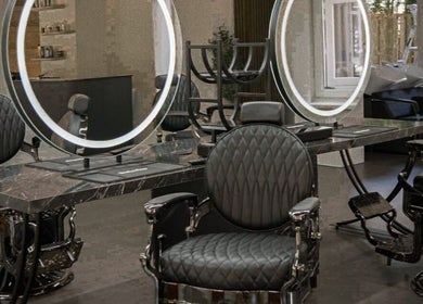 Stylish barber chairs and mirrors at Icon Barbershop Amsterdam, Noord-Holland, NL.