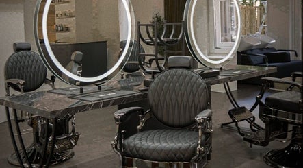Stylish barber chairs and mirrors at Icon Barbershop Amsterdam, Noord-Holland, NL.