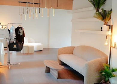 Stylish interior of Icon Barbershop Amsterdam, Noord-Holland, NL with modern decor and seating area.
