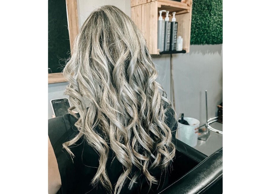 Stunning blonde curls at Authentic Cutz By Bernice, Gqeberha, Eastern Cape, ZA. Perfect salon hairstyle.