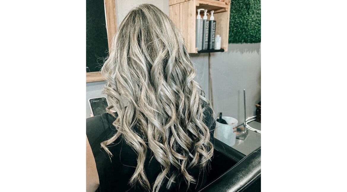 Stunning blonde curls at Authentic Cutz By Bernice, Gqeberha, Eastern Cape, ZA. Perfect salon hairstyle.