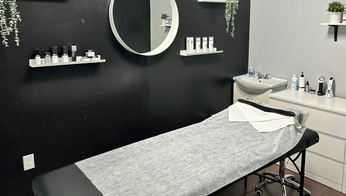 Chic treatment room at Selfish Beauty Lounge in Vaughan, Ontario, CA featuring a cozy bed and stylish decor.