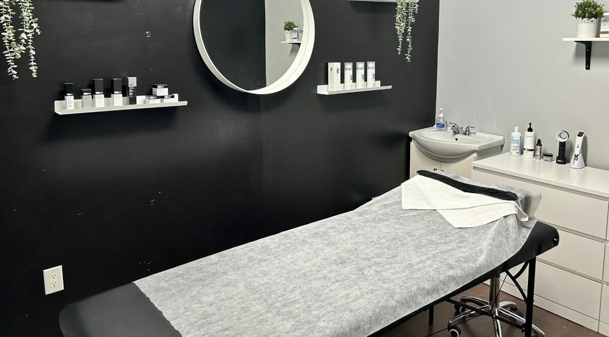 Chic treatment room at Selfish Beauty Lounge in Vaughan, Ontario, CA featuring a cozy bed and stylish decor.