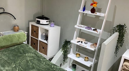 Tranquil therapy room at Paula Aesthetics & Holistics, North Houghton, England, GB. Featuring cozy decor.