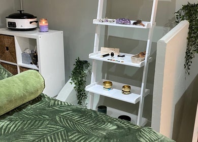 Relaxing treatment room at Paula Aesthetics & Holistics, North Houghton, England, GB with soothing decor.