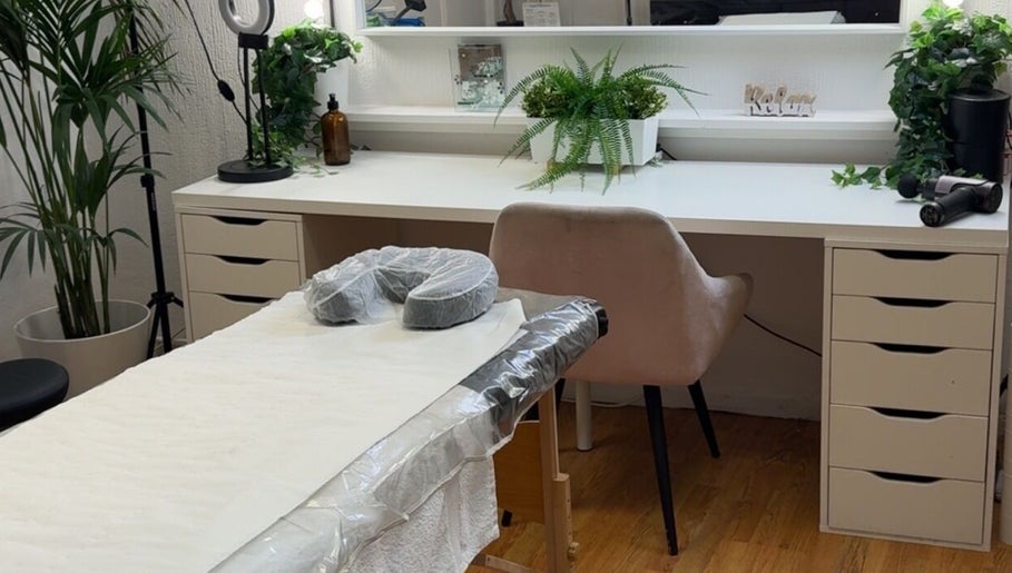 Luxury treatment room at Seasonal Glo' in Birmingham, England, GB, featuring modern decor and soothing ambiance.