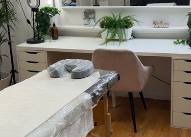 Luxury treatment room at Seasonal Glo' in Birmingham, England, GB, featuring modern decor and soothing ambiance.