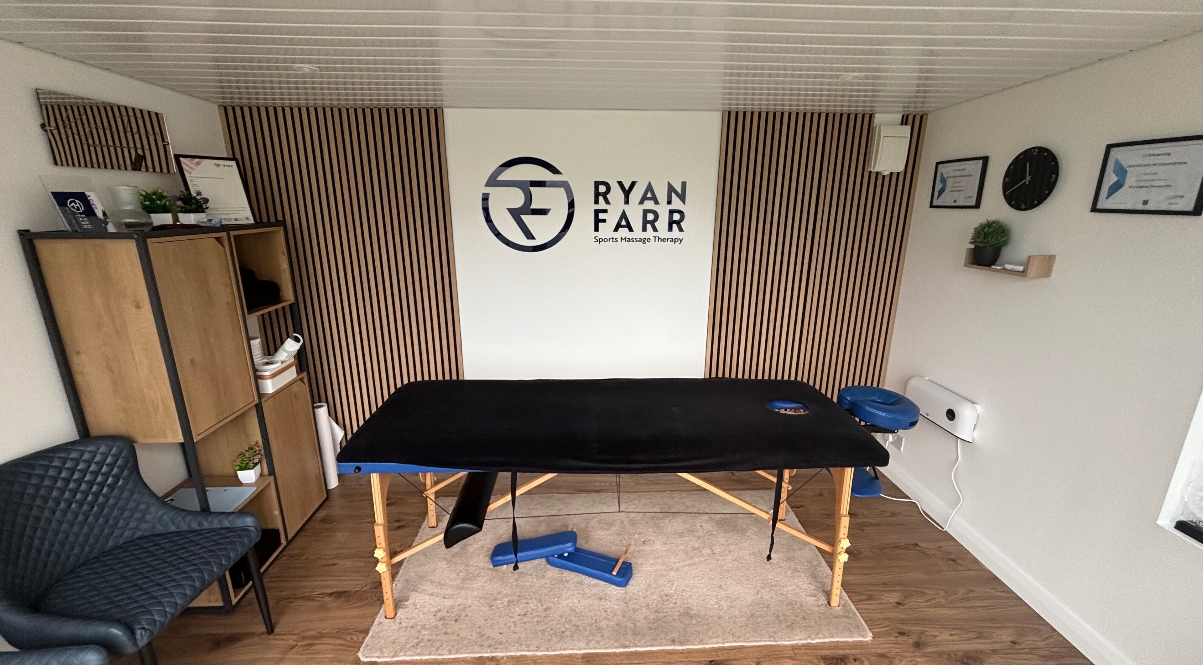 Warm, inviting therapy room at Ryan Farr Sports Massage Therapy, Moira, Northern Ireland, GB, featuring a massage table.