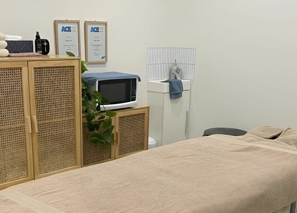 Calm massage room at Sunday Ridge Remedial Massage in Simpson, Victoria, AU with plush table and cozy decor.