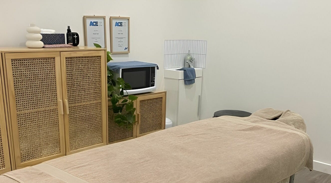 Calm massage room at Sunday Ridge Remedial Massage in Simpson, Victoria, AU with plush table and cozy decor.