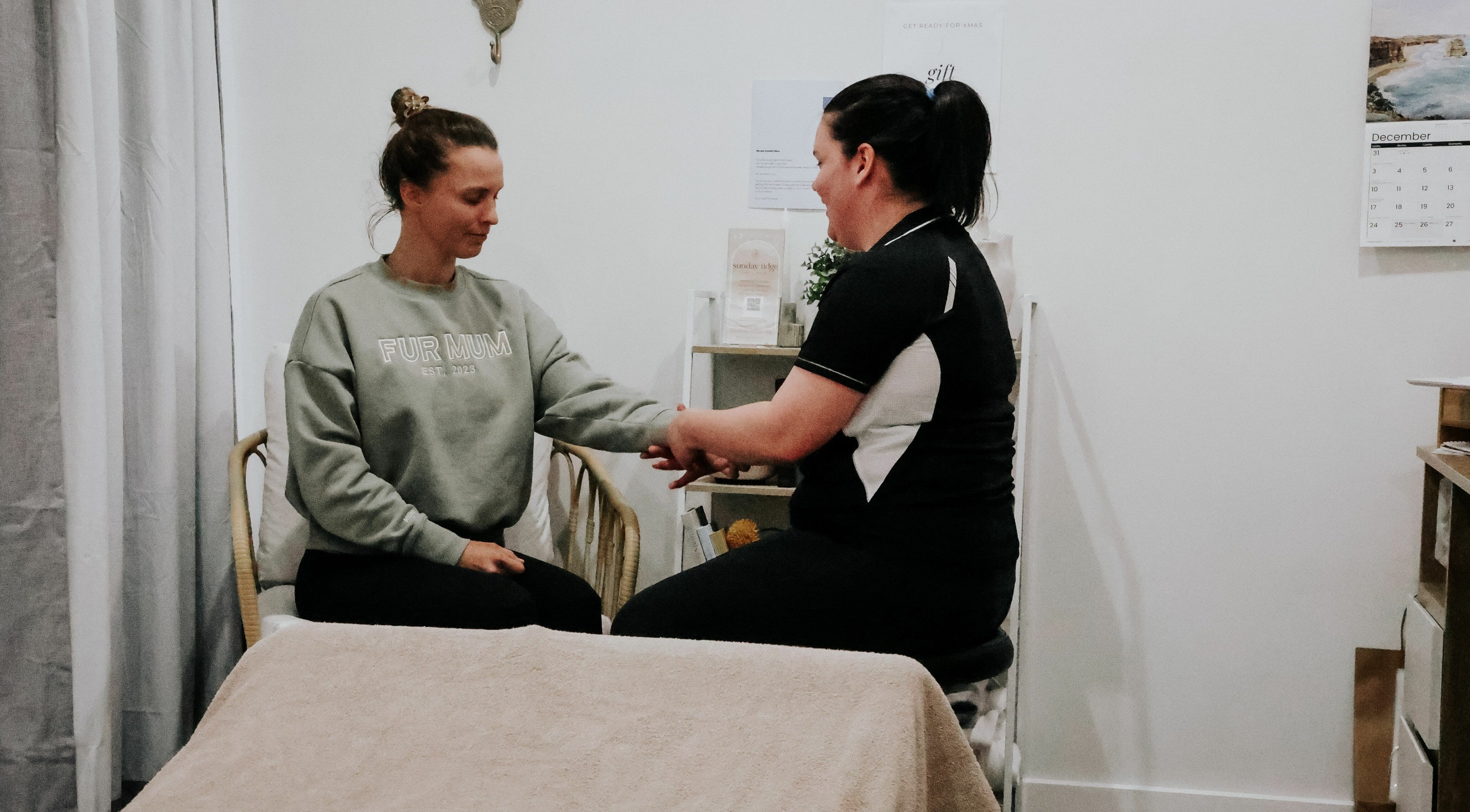 Client receiving hand massage at Sunday Ridge Remedial Massage in Simpson, Victoria, AU.