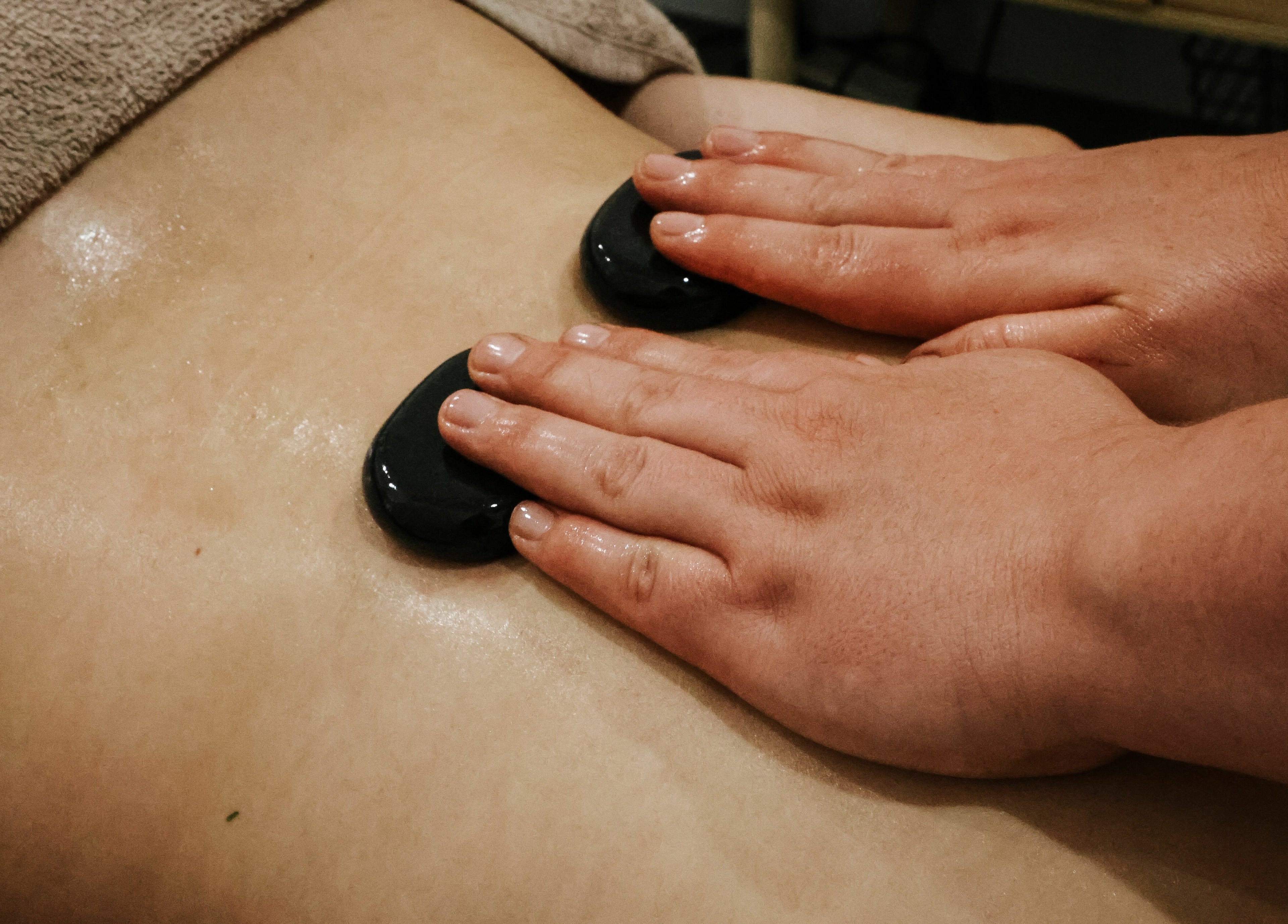 Hot stone massage at Sunday Ridge Remedial Massage in Simpson, Victoria, AU. Enhancing relaxation and well-being.