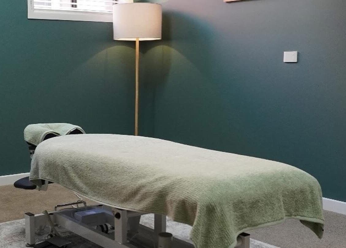 Calm therapy room at Sunday Ridge Remedial, KINFOLK Colac, Colac, Victoria, AU with massage table.