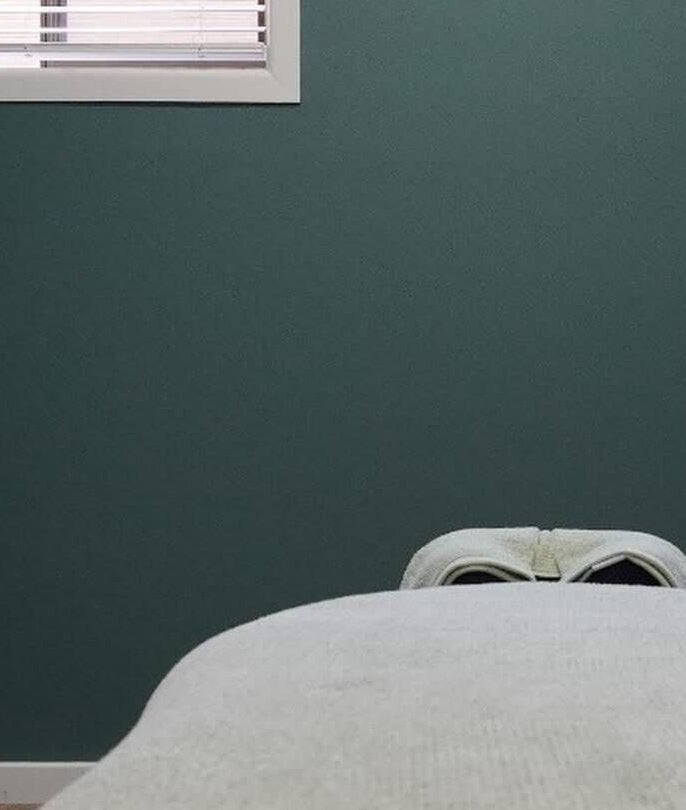 Tranquil massage room at Sunday Ridge Remedial in KINFOLK Colac, Colac, Victoria, AU with a comfortable massage table.