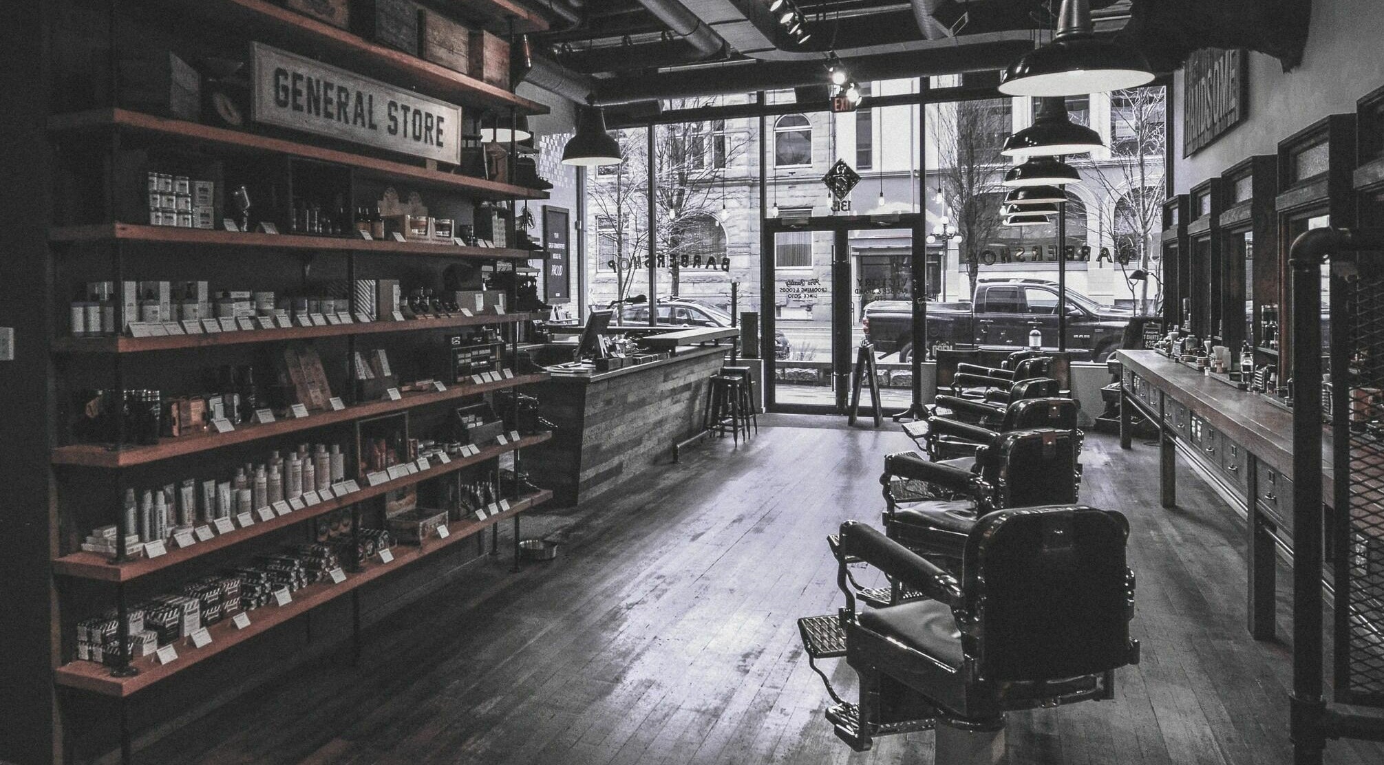 Inside Victory Barber & Brand | Victoria showcasing classic chairs and product displays in Victoria, British Columbia, CA.