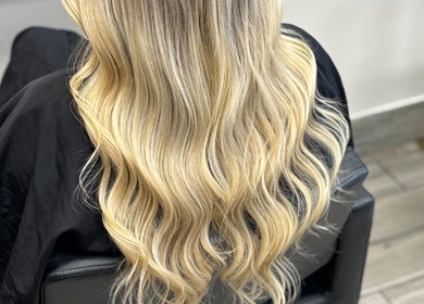 Blonde wavy hairstyle at ALS Hair in Clonmel, County Tipperary, IE, showcasing professional salon results.