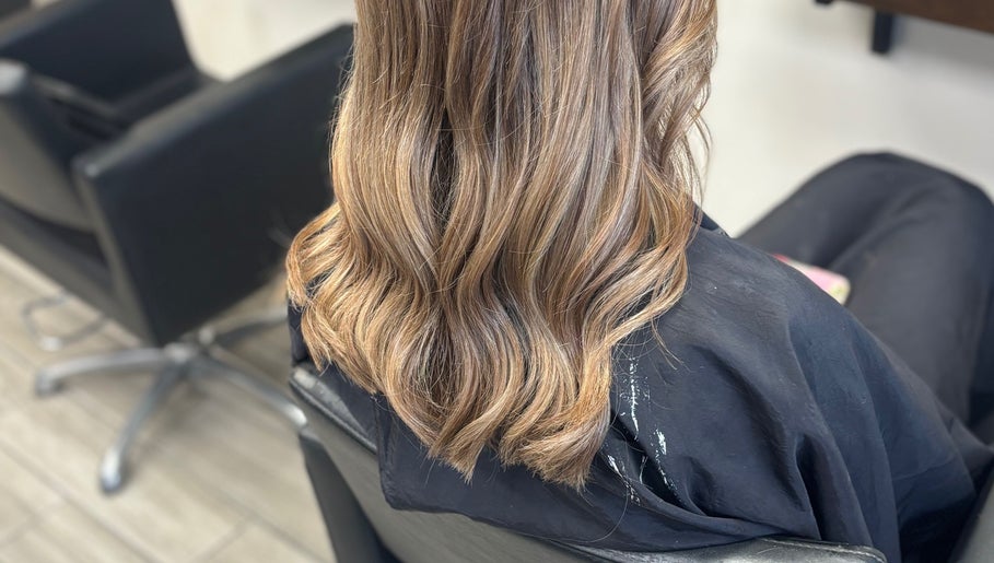 Stylish wavy hair styled at ALS Hair, Clonmel, County Tipperary, IE, showcasing expert hairdressing skills.