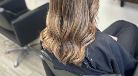 Stylish wavy hair styled at ALS Hair, Clonmel, County Tipperary, IE, showcasing expert hairdressing skills.