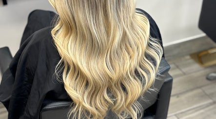 Long blonde hair styled in waves at ALS Hair, Clonmel, County Tipperary, IE.