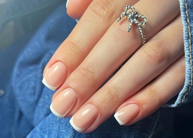 Elegant French manicure at Simmy & Co Nails in Melbourne, Victoria, AU. Perfect glossy finish.