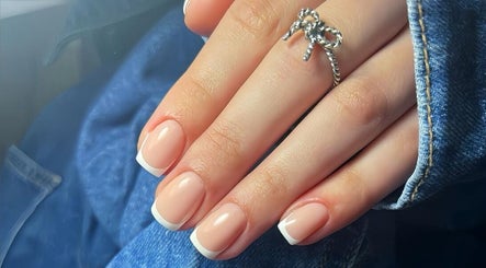 Elegant French manicure at Simmy & Co Nails in Melbourne, Victoria, AU. Perfect glossy finish.