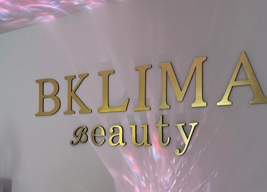 Elegant BKlima Beauty sign on the wall, Basildon, England, GB, with soft lighting.