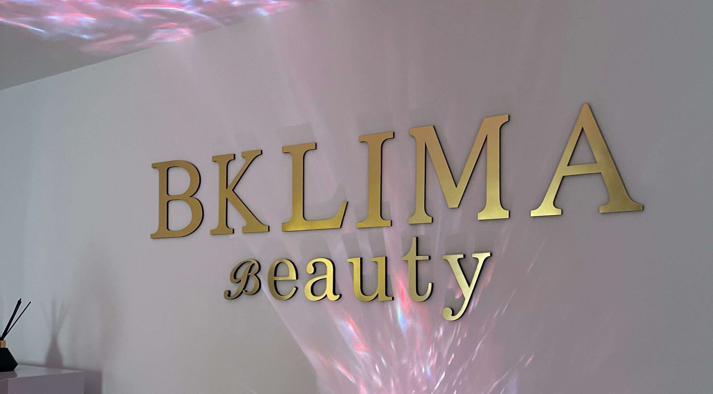 Elegant BKlima Beauty sign on the wall, Basildon, England, GB, with soft lighting.