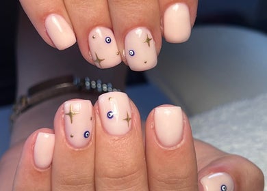 Elegant nail art with stars at BKlima Beauty, Basildon, England, GB. Perfectly manicured for style and flair.