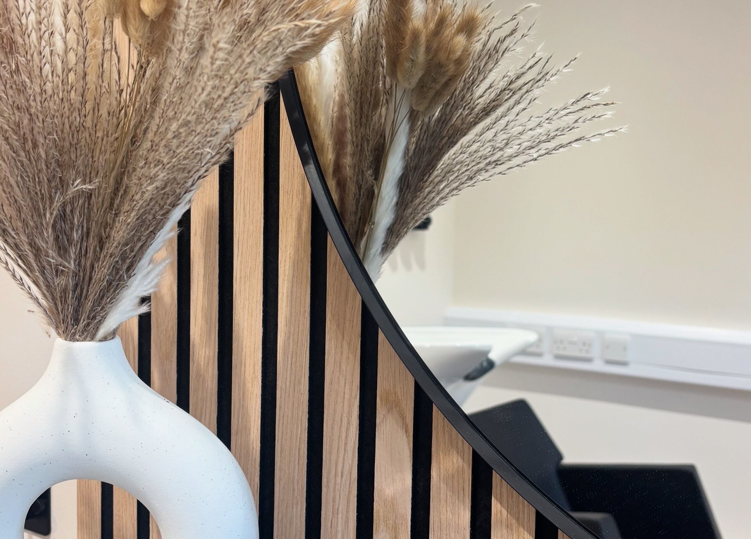Decorative vase with dried grasses at Francesca’s Hair Hideaway, West End, England, GB.
