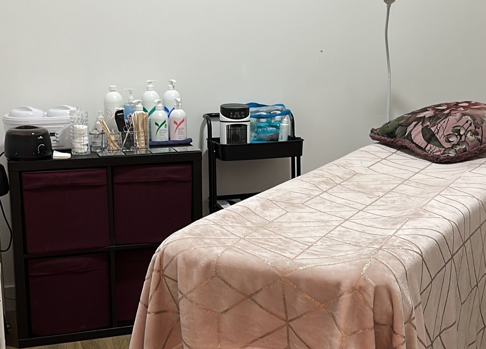 Cozy treatment room at Envy Salon, Redcar, TS10 1AD, England, GB with a plush bed and beauty products.