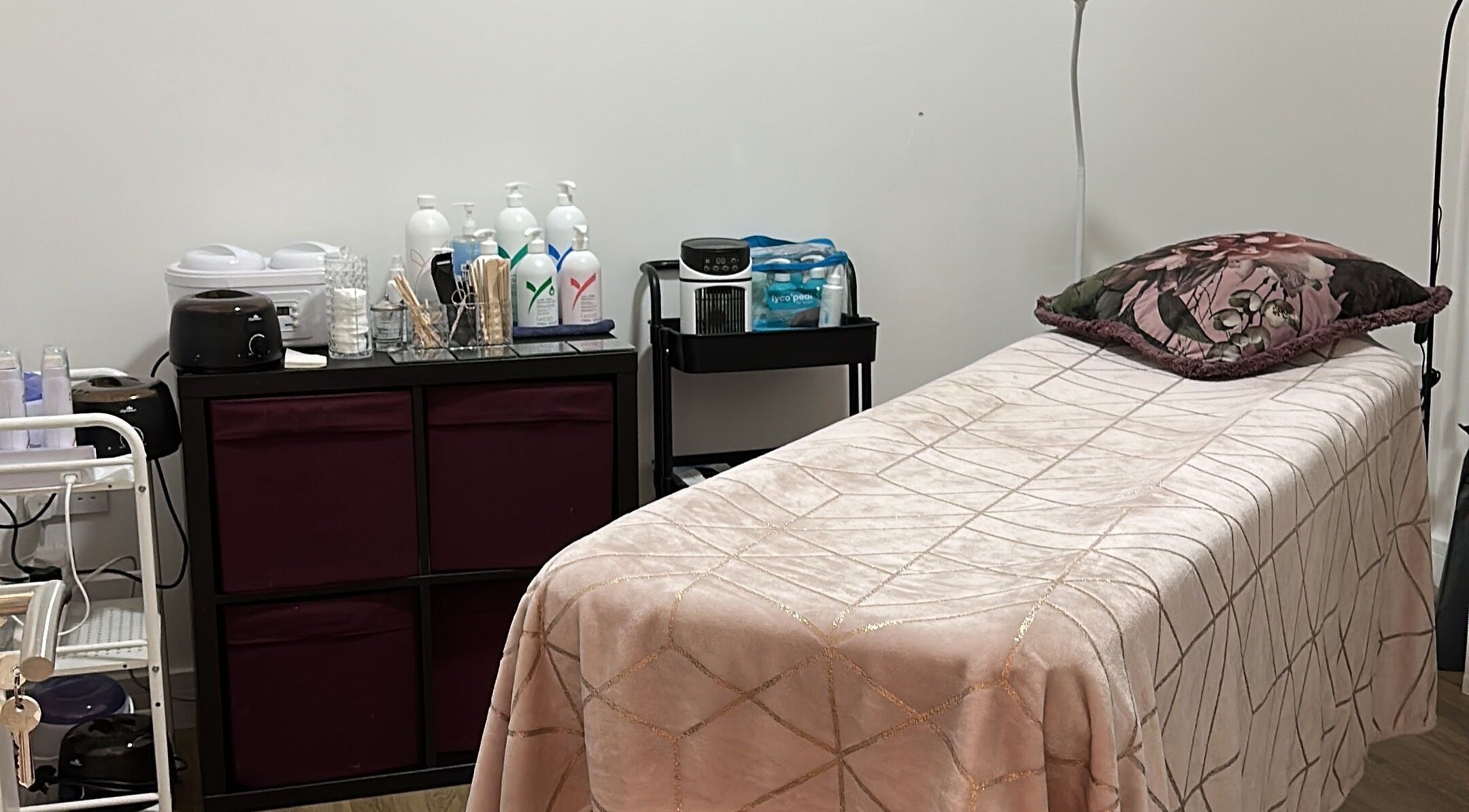 Cozy treatment room at Envy Salon, Redcar, TS10 1AD, England, GB with a plush bed and beauty products.