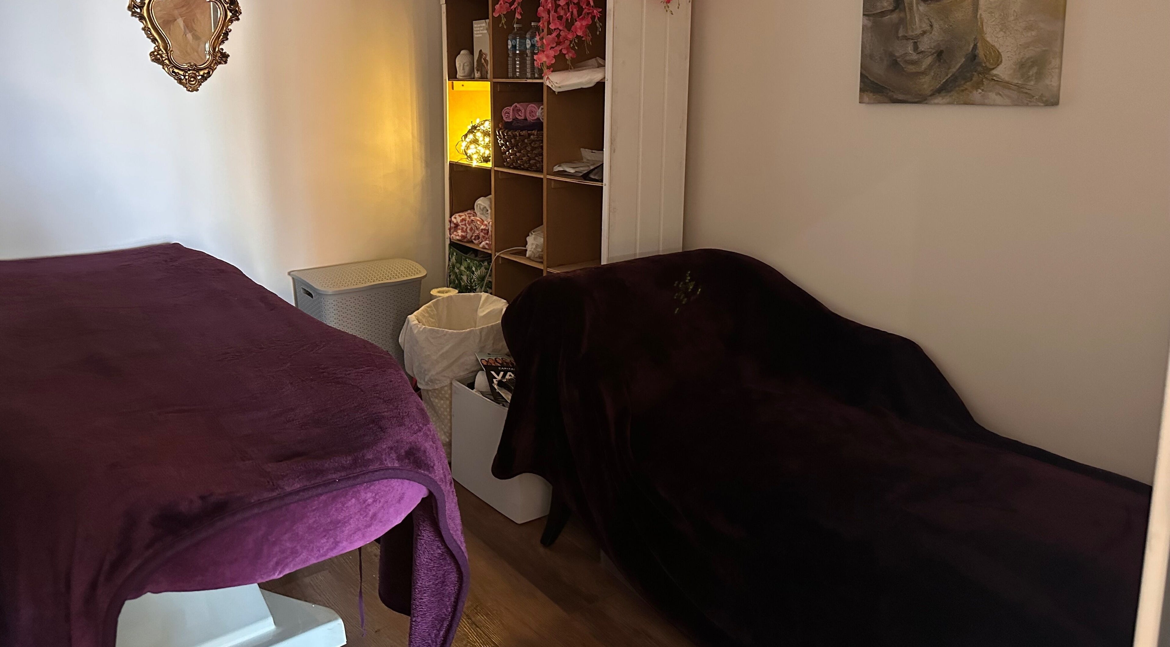 Tranquil massage room at Envy Salon, Redcar, TS10 1AD, England, GB, featuring plush furnishings and calming decor.