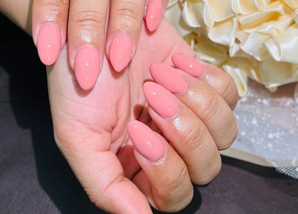 Elegant pink manicured nails at Revive Beauty Massage, Port Macquarie, New South Wales, AU.