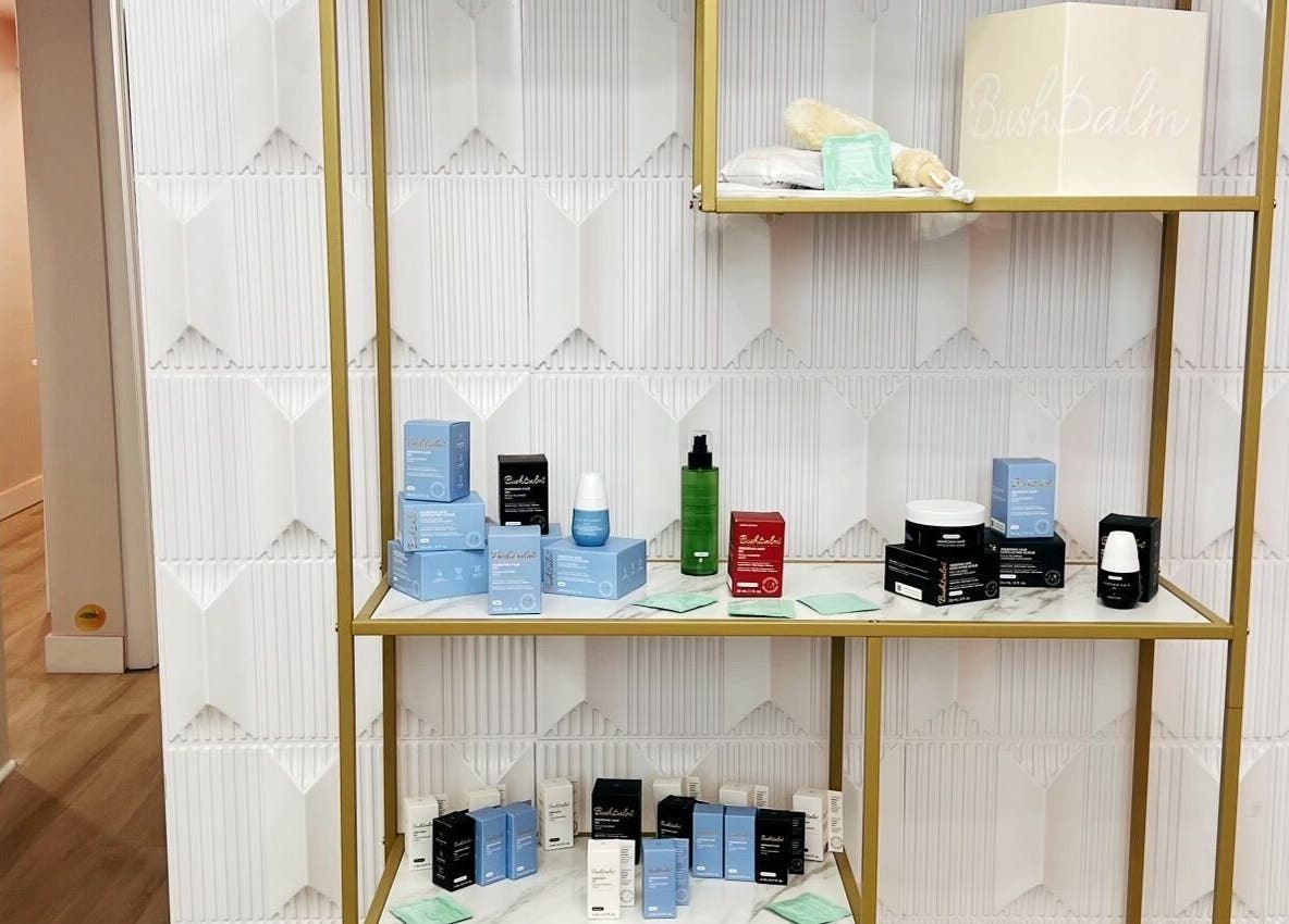 Elegant shelving with beauty products at Peach Pit Beauty Hub in Waterloo, Ontario, CA.