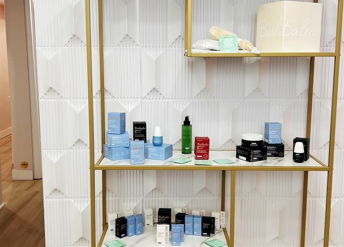 Elegant shelving with beauty products at Peach Pit Beauty Hub in Waterloo, Ontario, CA.