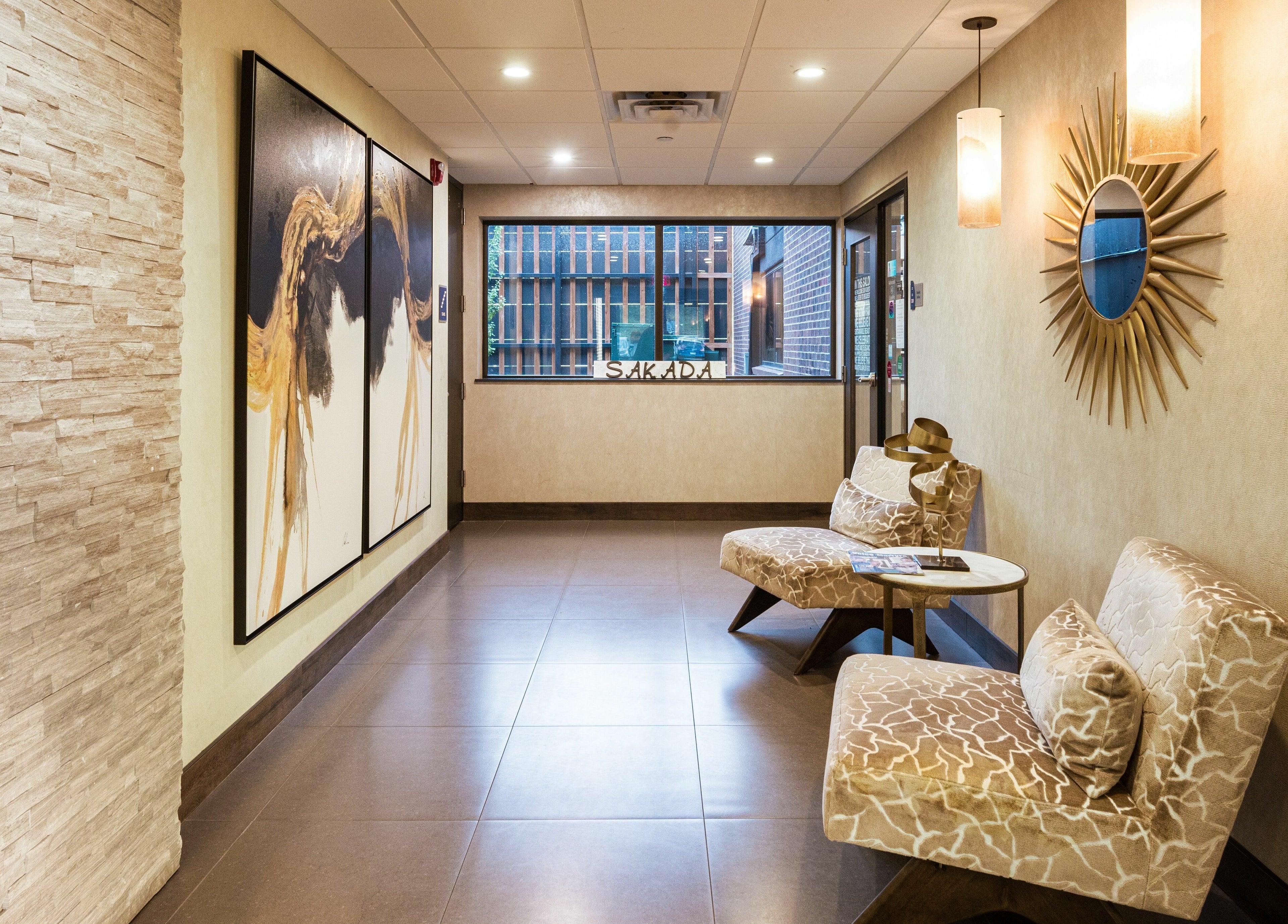 Elegant lobby at Sakada in Minnetonka, Minnesota, US, featuring chic decor and comfortable seating.