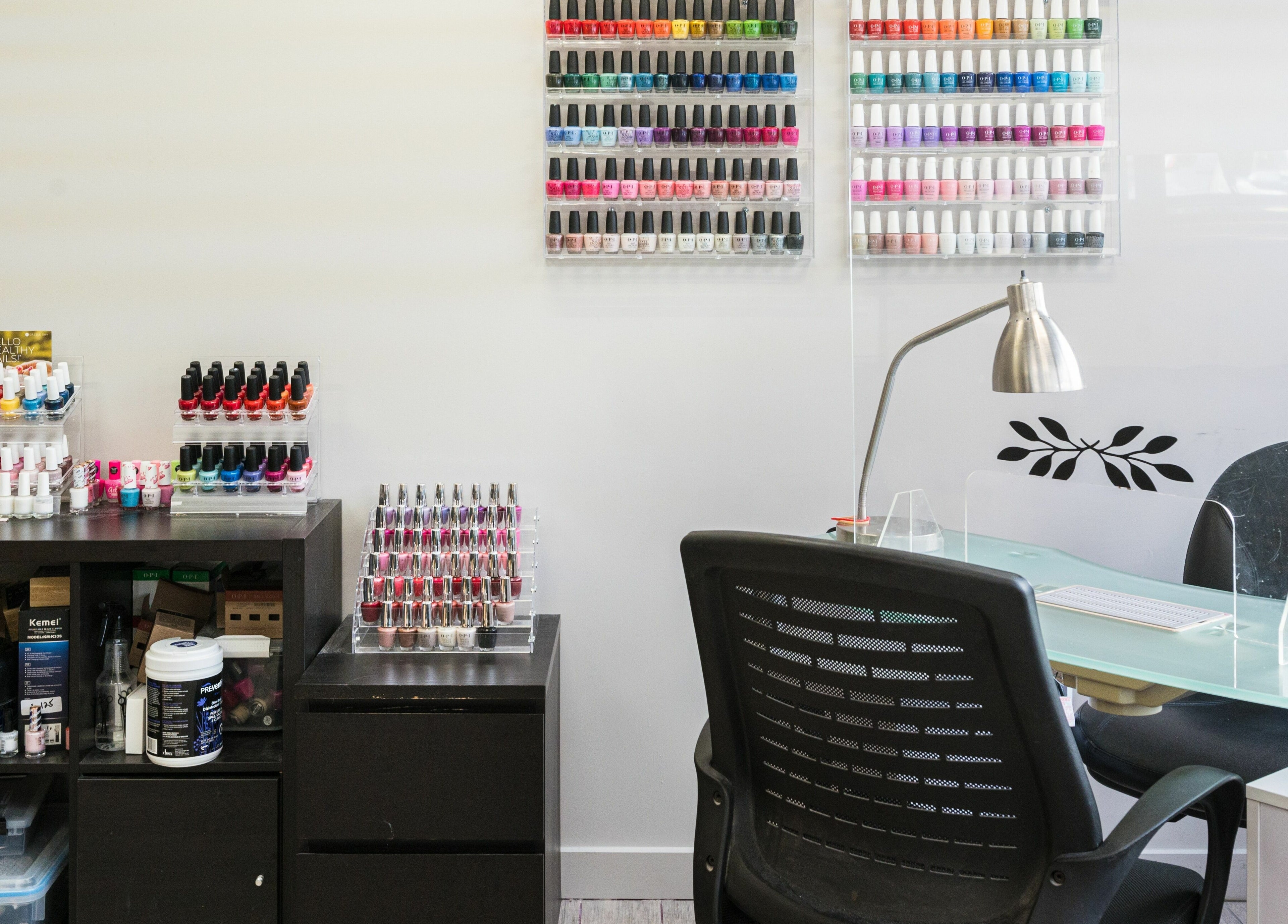 Nail polish display and manicure station at Sakada, Minnetonka, Minnesota, US offering vibrant nail services.
