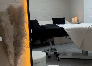 Elegant treatment room at Beauty Dolls in Basingstoke, England, GB, featuring modern decor and relaxation.