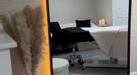Elegant treatment room at Beauty Dolls in Basingstoke, England, GB, featuring modern decor and relaxation.