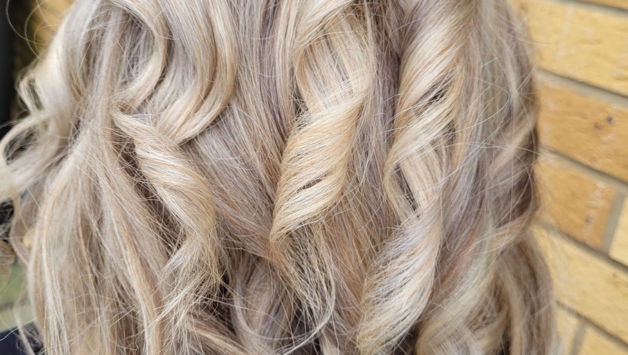 Close-up of expertly styled blonde waves at Hair by Alanna, Halstead, Essex, GB.