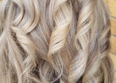 Close-up of expertly styled blonde waves at Hair by Alanna, Halstead, Essex, GB.