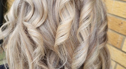 Close-up of expertly styled blonde waves at Hair by Alanna, Halstead, Essex, GB.