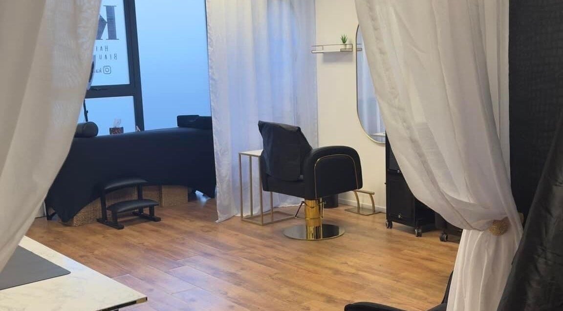 Elegant interior of K and V Hair and Beauty Room with plush seats in High Wycombe, England, GB.