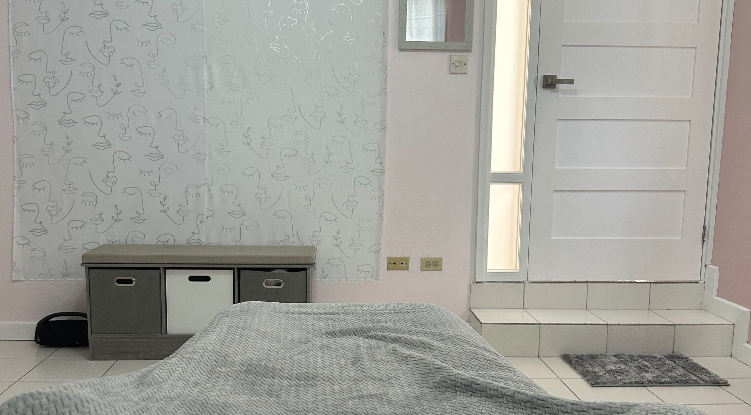 Cozy treatment room at Bare Faced Beauty in Bridgetown, Saint Michael, BB with minimalist decor.